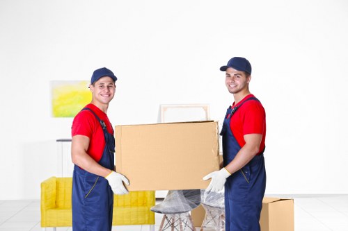 Staff preparing furniture and equipment for office removals in Stroudgreen